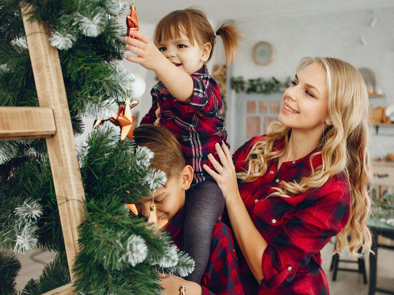 family-standing-home-near-christmas-tree_1157-25477 family-standing-home-near-christmas-tree_1157-25477